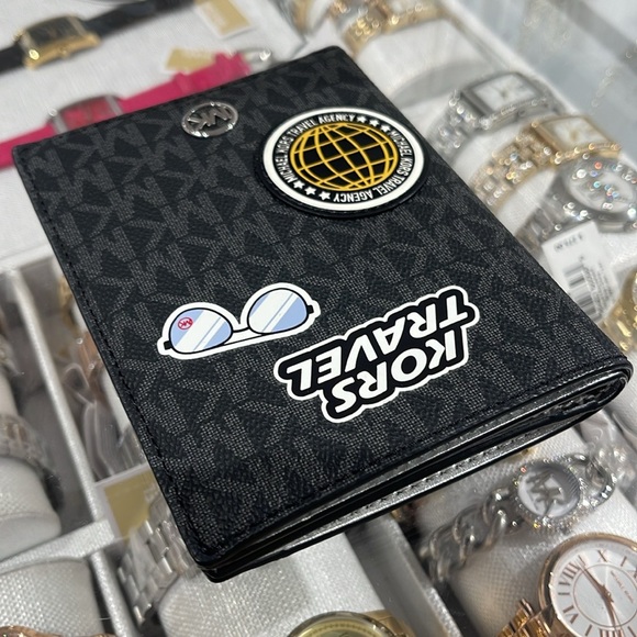 Michael Kors Jet Set Travel Md Embellished Signature Logo Passport Case
Black - Picture 2 of 16